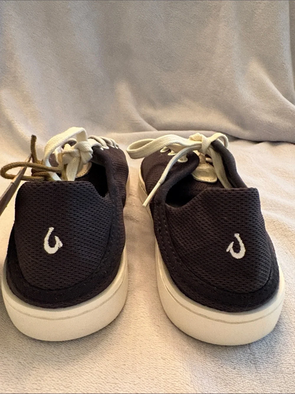 OluKai Men’s Black Low-Top Sneakers with White Laces